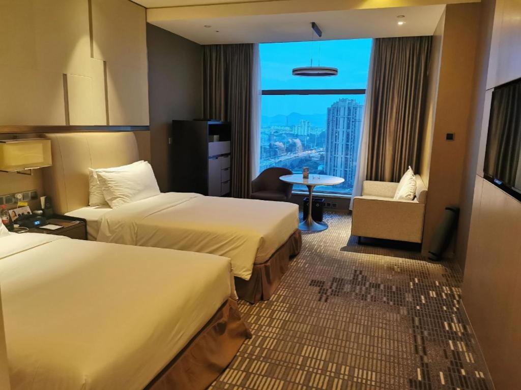 The Qube Hotel Xiangyang Сянян Екстериор снимка